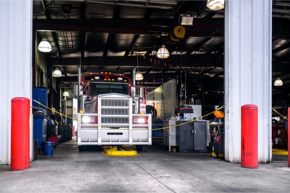 A semi-truck oil change in progress