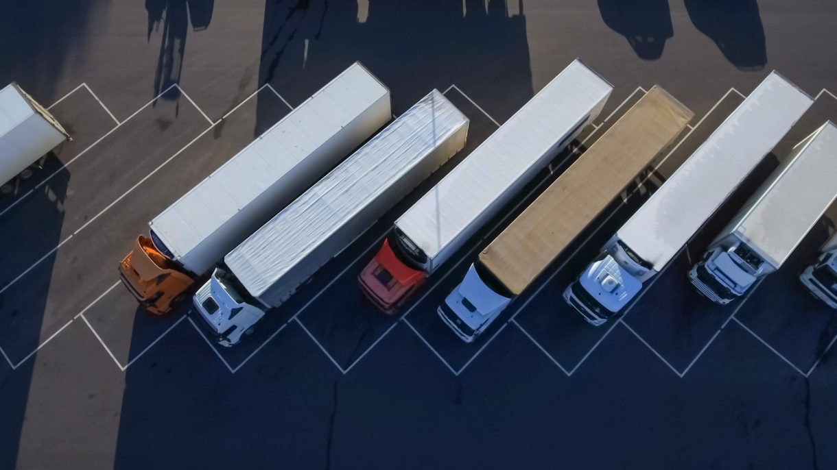 line of semi-trucks from above