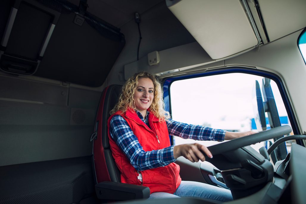 trucker in semi truck cab