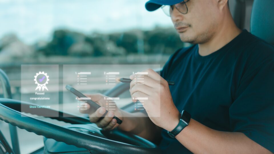 Truck driver taking an assessment for a certificate.