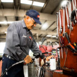 mechanic servicing a truck in a repair shop
